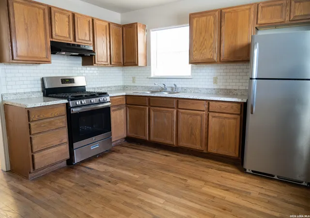 Photo 3 of Multi family home for sale at 1412 Whitman Ave, San Antonio, TX 78211 | MLS# 1971729 | Listing updated on 2026-09-17