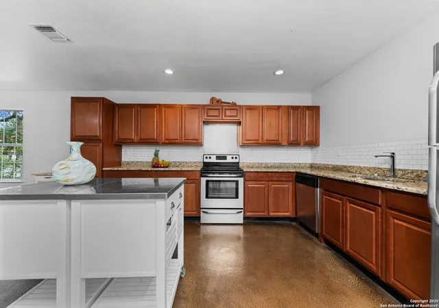 Photo 3 of Single family home for sale at 451 N San Joaquin Ave, San Antonio, TX 78228 | MLS# 1997353 | Listing updated on 2026-07-18