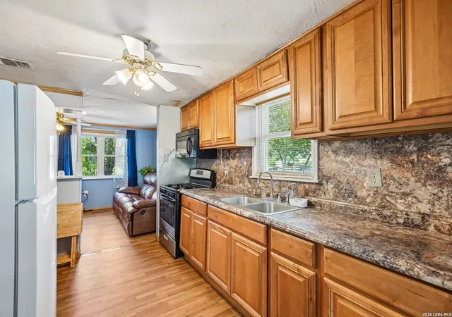 5th image of 619 Webb Ave, Devine, TX 78016 | MLS# 2003001