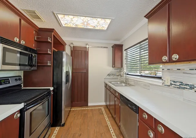 Photo 3 of Sale Pending at 5911 Hidden Iron Cir, San Antonio, TX 78250 | MLS# 2008451 | Listing updated on 2026-09-08