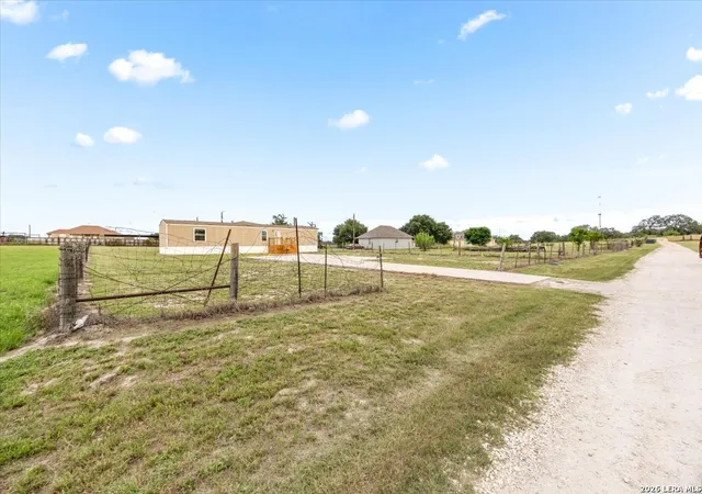 Photo 3 of Single family home for sale at 122 Amber Ln, Poteet, TX 78065 | MLS# 2009083 | Listing updated on 2026-09-20
