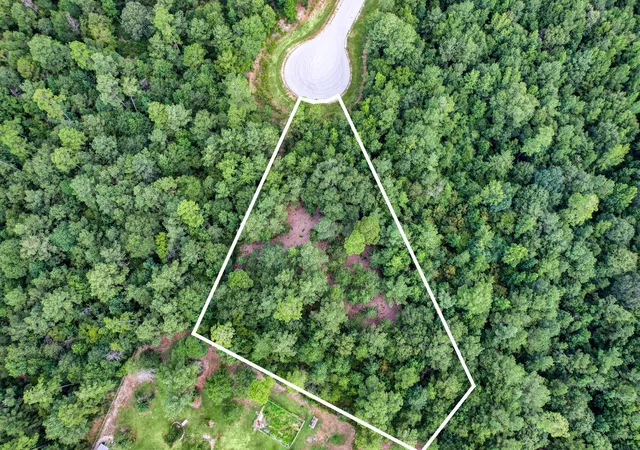 Photo 3 of Land for sale at 125 Pyrite Ct, Huntsville, TX 77340 | MLS# 34046645 | Listing updated on 2026-07-17