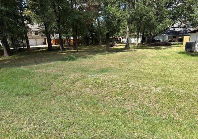 Photo 1 of Land for sale at 000 Ravemsworth Dr, Conroe, TX 77302 | MLS# 86754652 | Listing updated on 2026-07-11