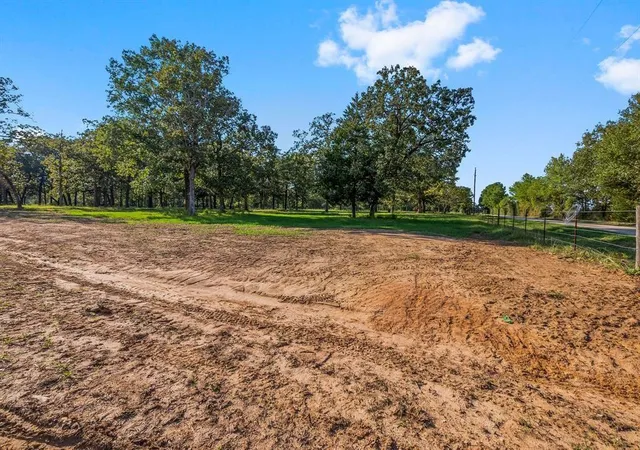 Photo 2 of Land for sale at 6159 Alans Memorial Ln, New Waverly, TX 77358 | MLS# 1093230 | Listing updated on 2026-05-19