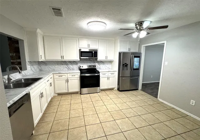 Photo 3 of Single family home for sale at 11915 Fallbrook Dr, Houston, TX 77065 | MLS# 7553157 | Listing updated on 2026-09-17