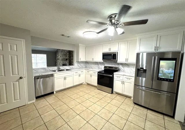 Photo 4 of Single family home for sale at 11915 Fallbrook Dr, Houston, TX 77065 | MLS# 7553157 | Listing updated on 2026-09-17