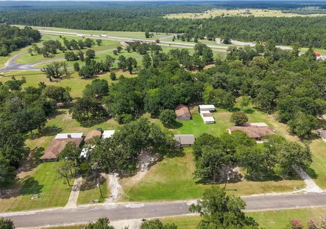 Photo 1 of Single family home for sale at 21 Wood Lodge Dr, Huntsville, TX 77320 | MLS# 24714160 | Listing updated on 2026-09-10