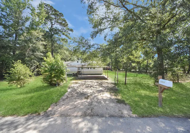 Photo 2 of Single family home for sale at 14009 Rustic Lane, Conroe, TX 77306 | MLS# 24000098 | Listing updated on 2026-08-25