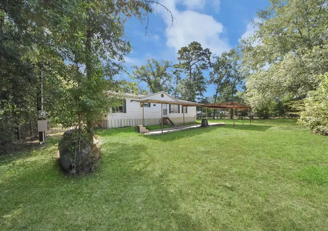 Photo 3 of Single family home for sale at 14009 Rustic Lane, Conroe, TX 77306 | MLS# 24000098 | Listing updated on 2026-08-25