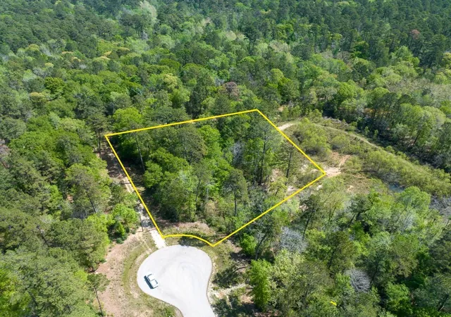 Photo 1 of Land for sale at 1 Sandstone Ln, Huntsville, TX 77340 | MLS# 44671477 | Listing updated on 2026-03-30