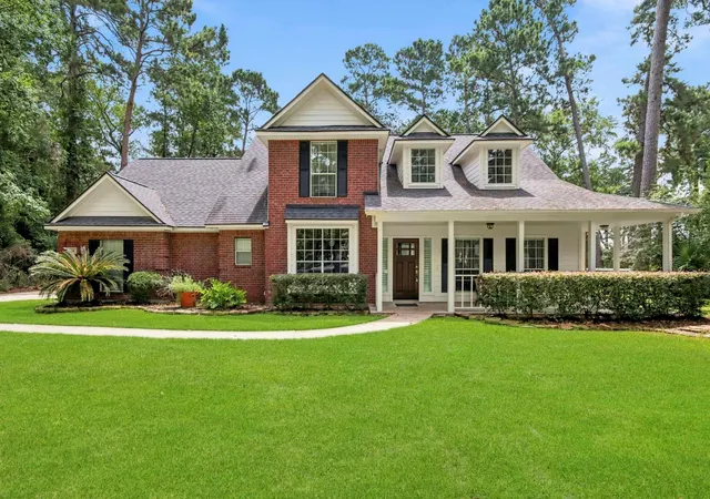 Photo 1 of Single family home for sale at 14 Crk Forest Ln, Conroe, TX 77384 | MLS# 27954059 | Listing updated on 2026-07-22
