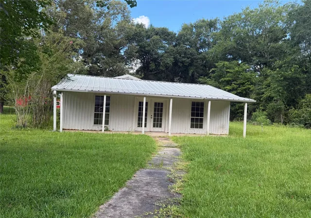 2nd image of 9950 Oak Tree Dr, Conroe, TX 77303 | MLS# 30507118