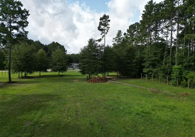 Photo 2 of Land for sale at 180 County Rd 5015, Cleveland, TX 77327 | MLS# 18350744 | Listing updated on 2026-09-04