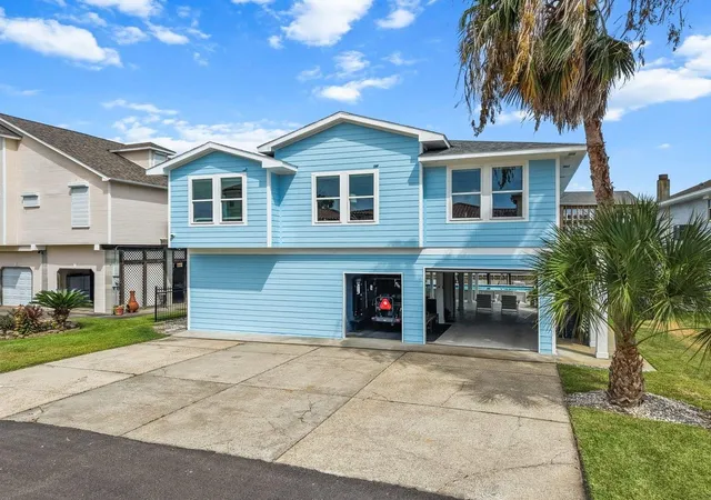 Photo 2 of Single family home for sale at 214 Sampan Dr, Tiki Island, TX 77554 | MLS# 98788398 | Listing updated on 2026-09-12