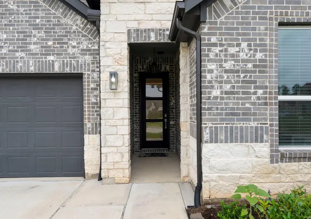 Photo 2 of Single family home for sale at 15220 Tattle Crk Ln, Conroe, TX 77384 | MLS# 90116187 | Listing updated on 2026-07-16