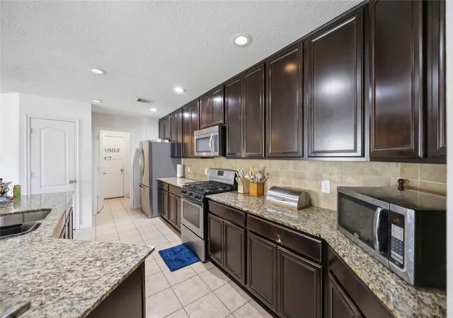Photo 4 of Townhouse for sale at 15338 Trinity Meadow Dr, Missouri City, TX 77489 | MLS# 10536187 | Listing updated on 2026-08-06