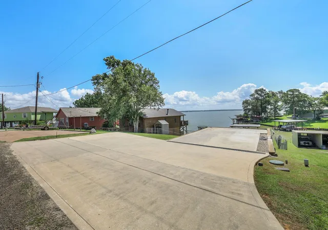 Photo 4 of Land for sale at 321 E Woodland Shrs Dr, Pointblank, TX 77364 | MLS# 77599380 | Listing updated on 2026-07-25