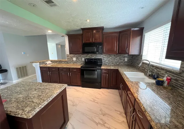 Photo 3 of Single family home for sale at 13411 Natasha Ln, Houston, TX 77015 | MLS# 33903017 | Listing updated on 2026-09-09