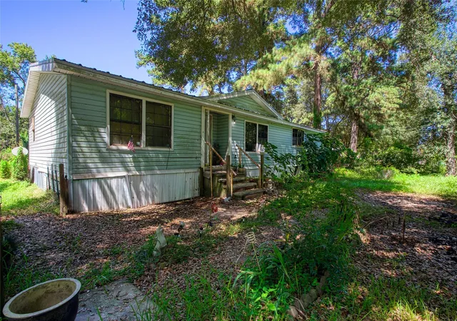 Photo 2 of Single family home for sale at 389 County Road 2281, Cleveland, TX 77327 | MLS# 10767973 | Listing updated on 2026-08-26