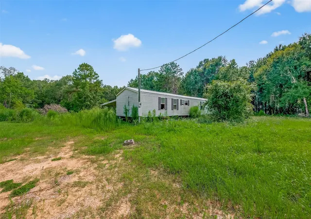 3rd image of 905 County Road 379, Cleveland, TX 77328 | MLS# 89651191