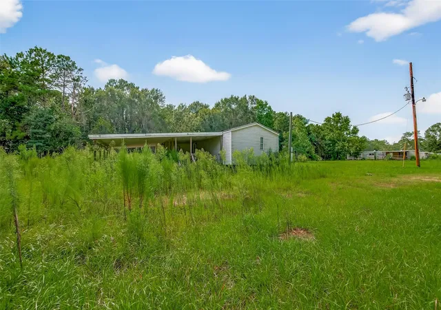 4th image of 905 County Road 379, Cleveland, TX 77328 | MLS# 89651191