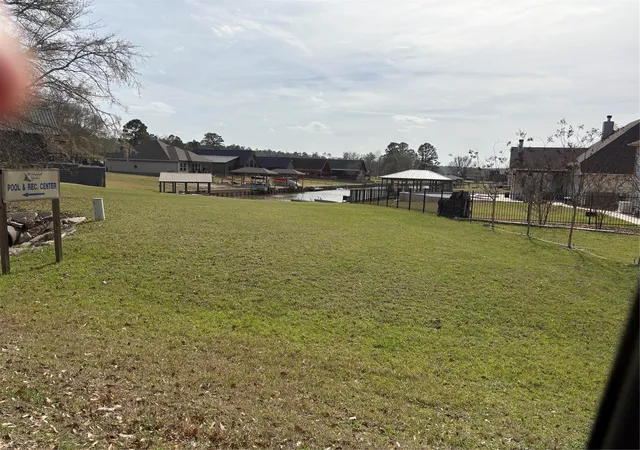 Photo 1 of Land for sale at 114 Wildwood Lake Dr N, Huntsville, TX 77340 | MLS# 43880431 | Listing updated on 2026-06-15
