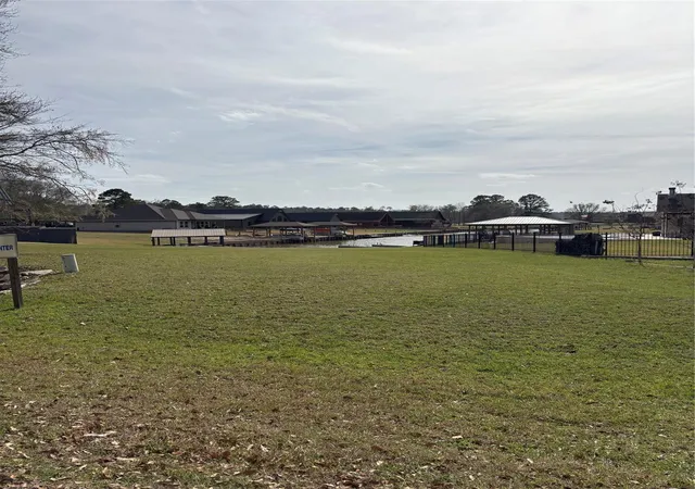 Photo 2 of Land for sale at 114 Wildwood Lake Dr N, Huntsville, TX 77340 | MLS# 43880431 | Listing updated on 2026-06-15