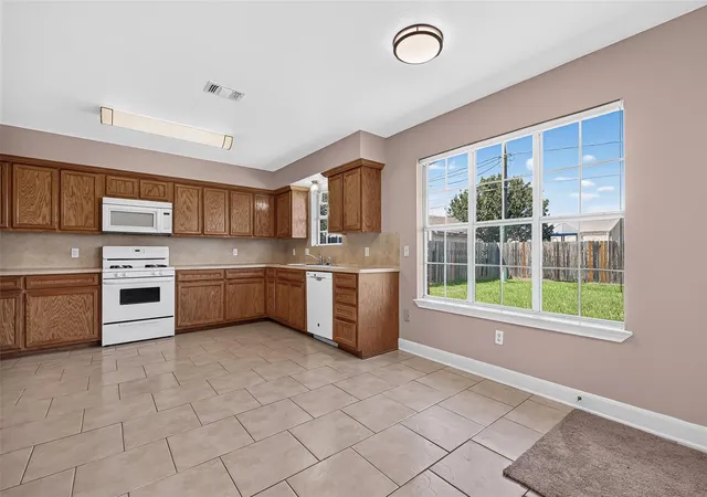 Photo 4 of Single family home for sale at 8721 Garrett St, Needville, TX 77461 | MLS# 73361489 | Listing updated on 2026-09-13