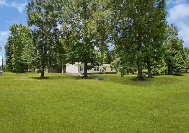 Photo 2 of Single family home for sale at 12617 Highway 105, Cleveland, TX 77327 | MLS# 37249127 | Listing updated on 2026-09-11