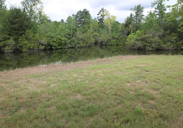 Photo 1 of Land for sale at 63 N Smith Loop, Cleveland, TX 77327 | MLS# 92532353 | Listing updated on 2025-11-24