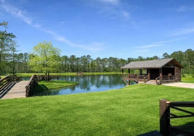 1st image of 214 Hunters Hill Rd, Oakhurst, TX 77359 | MLS# 17923405