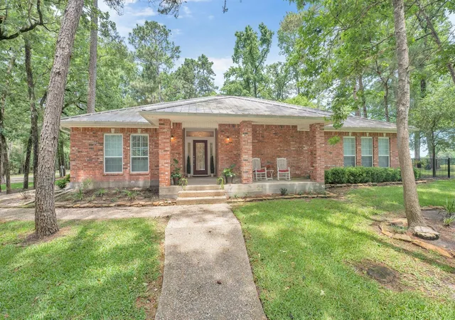 Photo 1 of Single family home for sale at 24400 Pine Valley Loop, Huntsville, TX 77320 | MLS# 70848369 | Listing updated on 2026-08-25