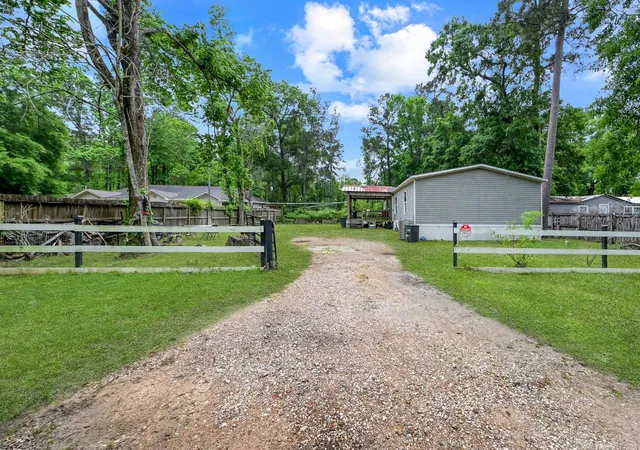 Single family home for sale at 23594 Pine Forest Dr, New Caney, TX 77357 | MLS# 28620487