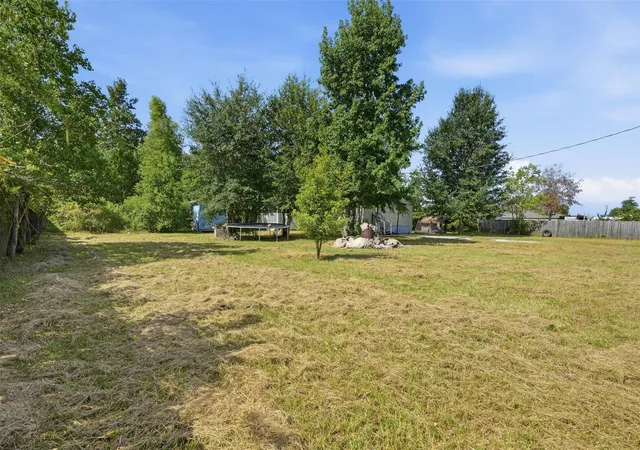 19th image of 910 County Road 3556, Cleveland, TX 77327 | MLS# 70252025