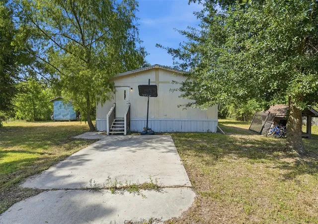2nd image of 910 County Road 3556, Cleveland, TX 77327 | MLS# 70252025