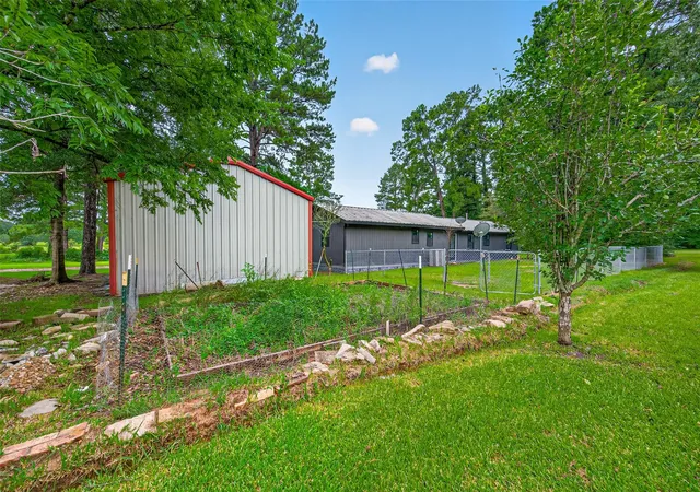 Photo 3 of Sale Pending at 13 Pine Needle Ln, New Waverly, TX 77358 | MLS# 44172210 | Listing updated on 2026-09-01