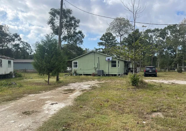 Photo 2 of Multi family home for sale at 709 County Rd 3431 E, Cleveland, TX 77327 | MLS# 76997213 | Listing updated on 2026-08-23