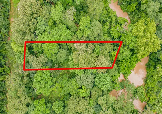 Photo 1 of Land for sale at 12572 Royal Crk Rd, Conroe, TX 77303 | MLS# 14925738 | Listing updated on 2026-05-22
