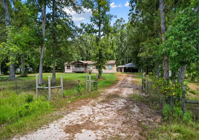 Photo 2 of Single family home for sale at 863 E County Road 3141 E, Cleveland, TX 77327 | MLS# 12253361 | Listing updated on 2026-09-10