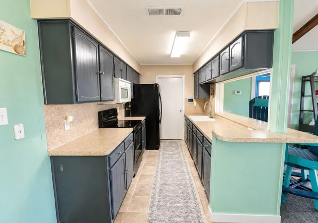 3rd image of 1319 Maui Dr, Galveston, TX 77554 | MLS# 67480072