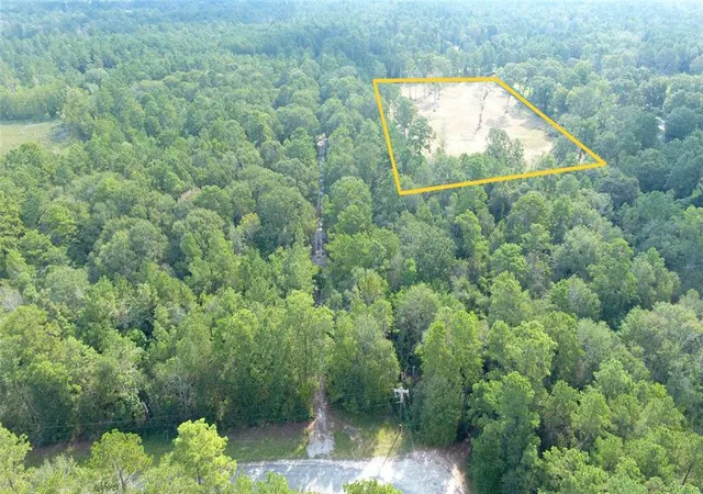 Photo 2 of Land for sale at 12075 Coon Holw Rd, Conroe, TX 77306 | MLS# 95487433 | Listing updated on 2026-09-09