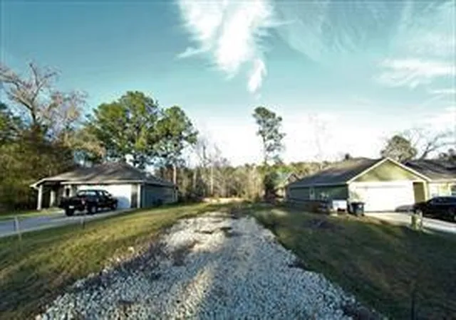 Photo 1 of Land for sale at 13 Sunny Hl Dr, Huntsville, TX 77340 | MLS# 28205678 | Listing updated on 2026-04-23