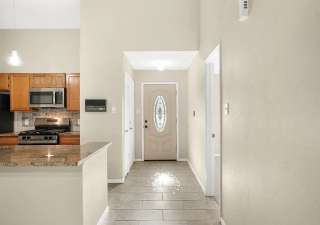 Photo 3 of Townhouse for sale at 702 W Country Grv Cir, Pearland, TX 77584 | MLS# 39055616 | Listing updated on 2026-08-03