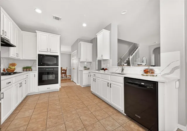 Photo 2 of Single family home for sale at 17706 Emerald Garden Ln, Houston, TX 77084 | MLS# 48301636 | Listing updated on 2026-09-19