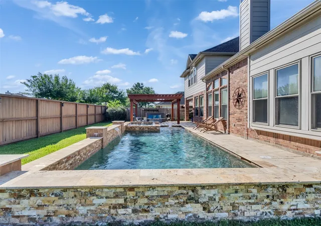 Photo 2 of Single family home for sale at 607 Ivory Stone Ln, League City, TX 77573 | MLS# 88498264 | Listing updated on 2026-08-28