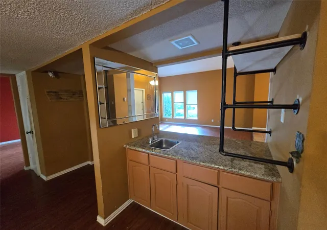 Photo 4 of Single family home for sale at 10410 Tennis Ct, Houston, TX 77099 | MLS# 4742419 | Listing updated on 2026-10-08