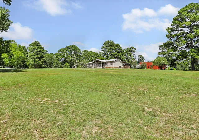 4th image of 16980 Main Dr, Willis, TX 77318 | MLS# 67303236