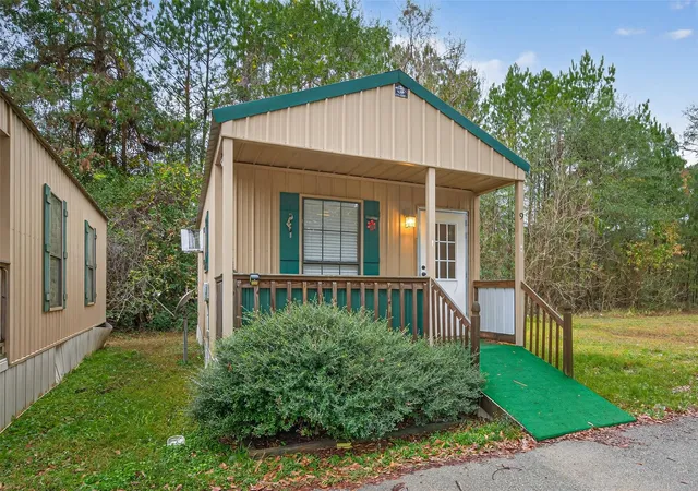 Photo 3 of Single family home for sale at 11497 Coon Holw Rd, Conroe, TX 77306 | MLS# 97245939 | Listing updated on 2026-05-07