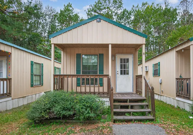 Photo 3 of Single family home for sale at 11497 Coon Holw Rd, Conroe, TX 77306 | MLS# 97245939 | Listing updated on 2026-05-07