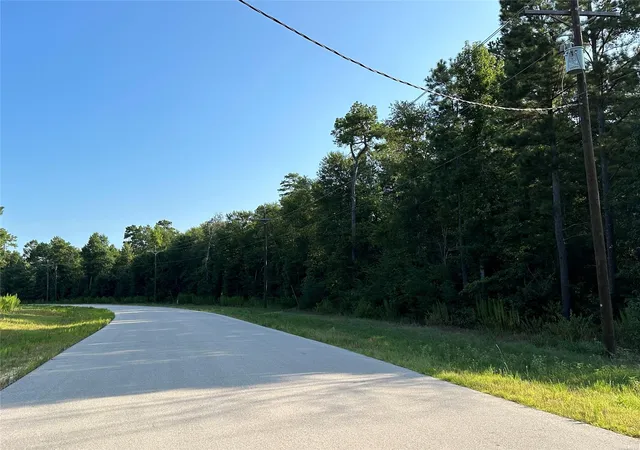 Photo 3 of Land for sale at 00 Rim Rock Rd, Huntsville, TX 77340 | MLS# 47794472 | Listing updated on 2026-01-16
